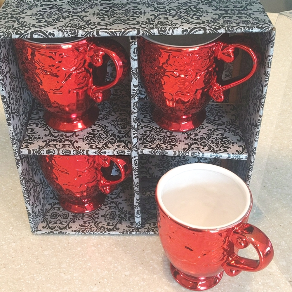Set of four decorative holiday mugs